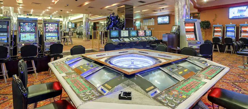 physical casino, casino game room, roulette, slots